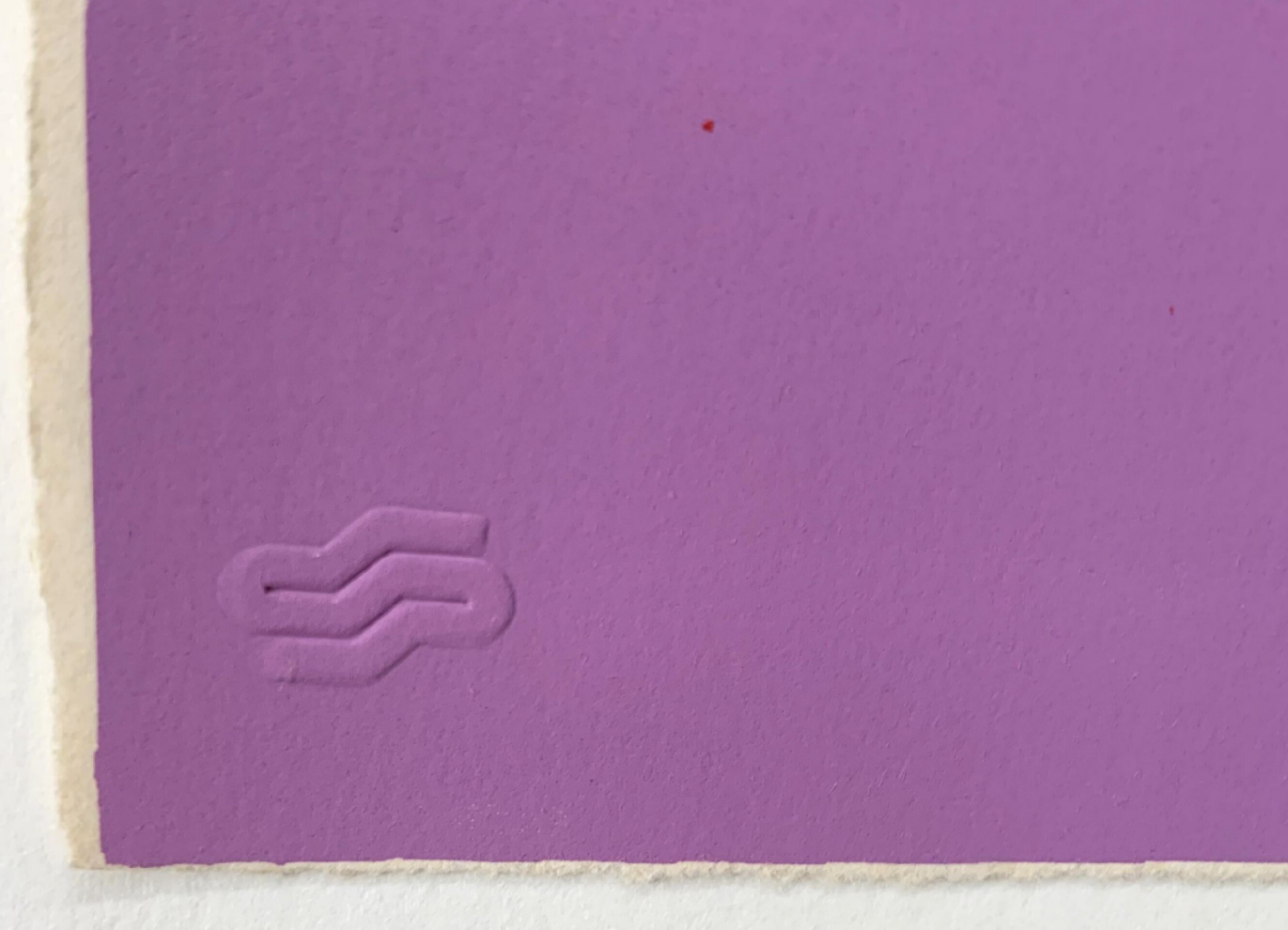 Mildred Scheel — embossed mark and surface detail near the lower left edge